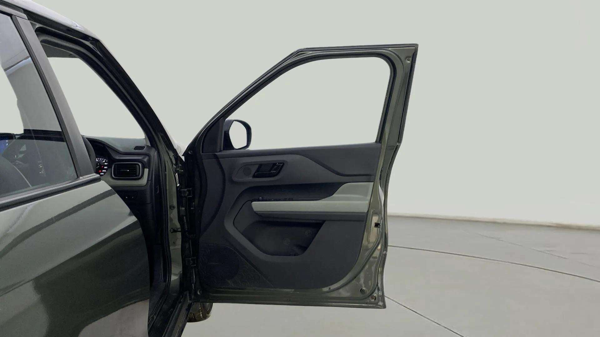 Driver door interior view of a Tata Punch