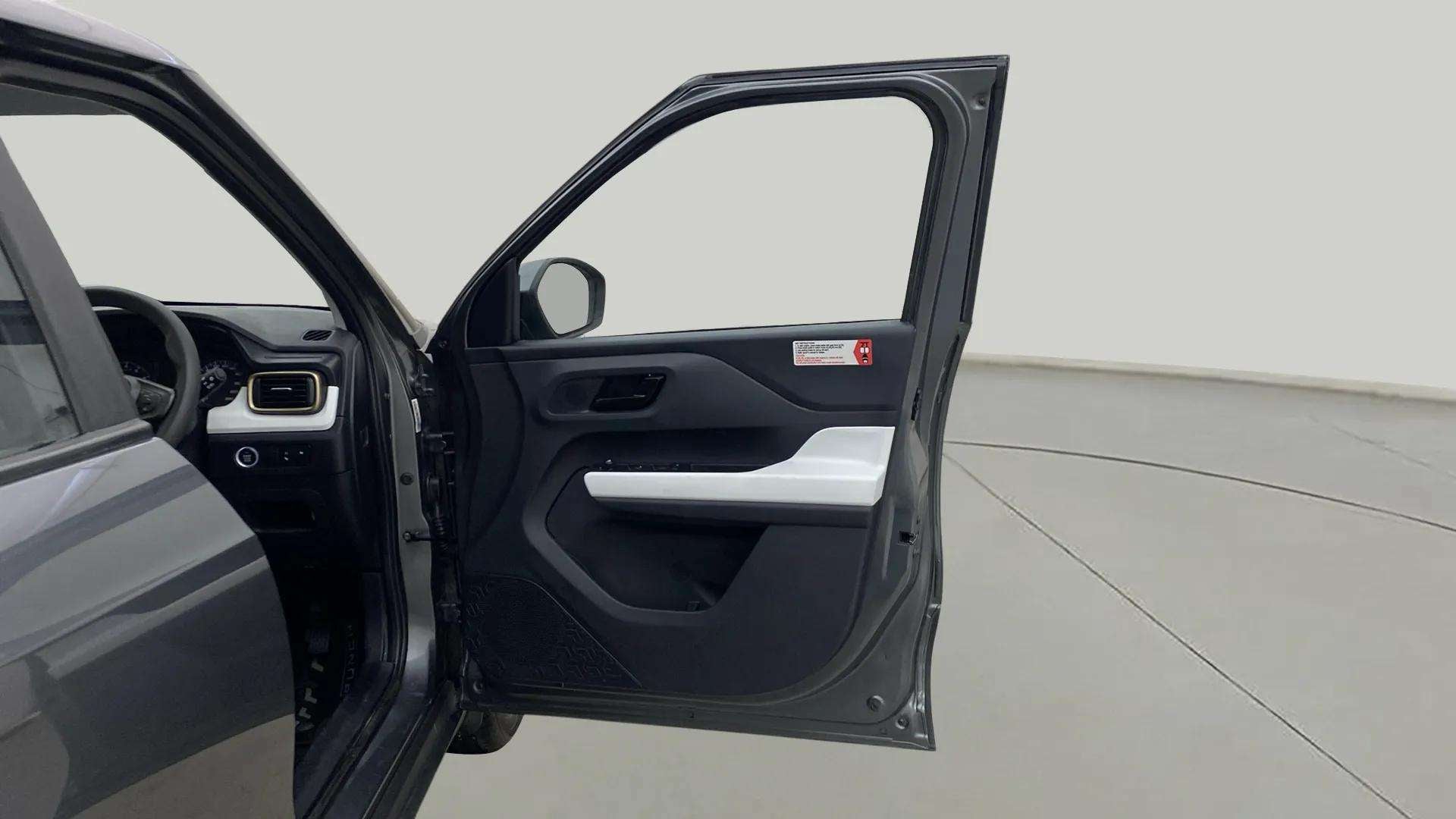 Driver side door and interior of a Tata Punch