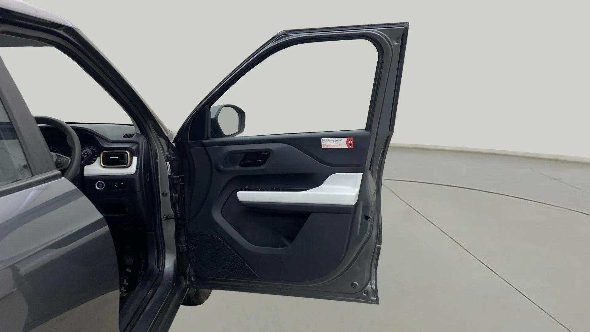 Driver side door and interior of a Tata Punch