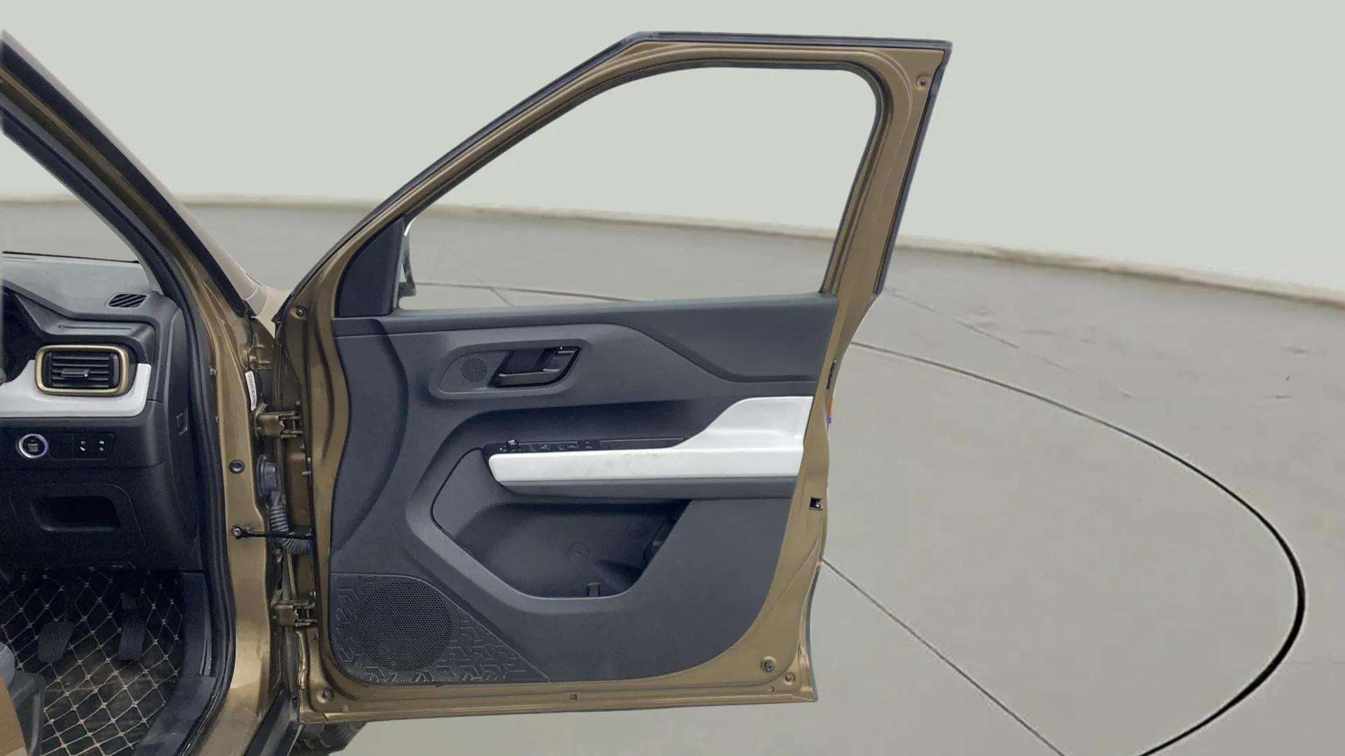 Front interior door panel of a Tata Punch