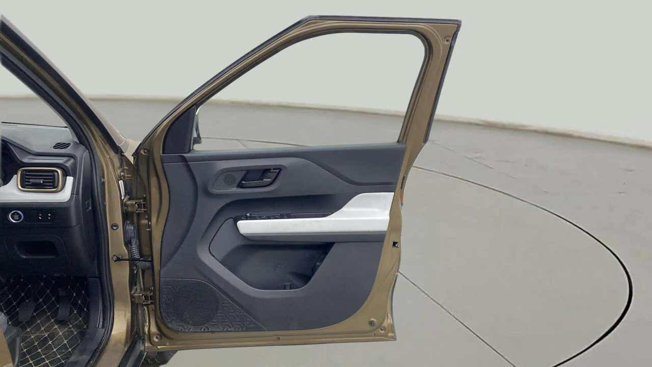 Front interior door panel of a Tata Punch