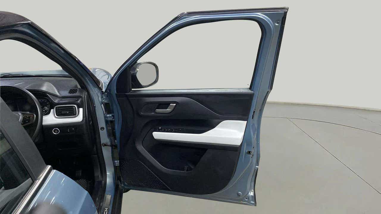 Driver side door and dashboard of a Tata Punch