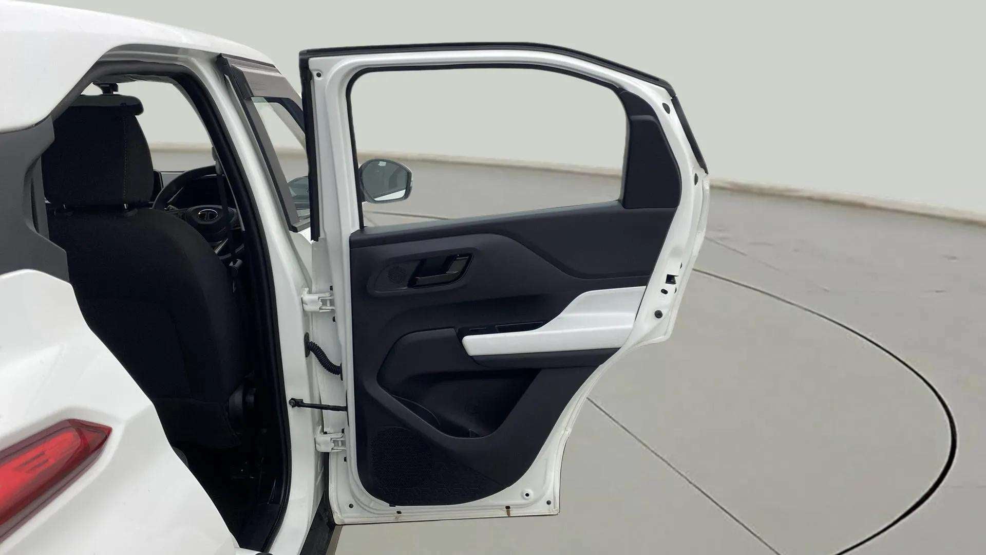 Rear left door interior of a Orcus White Tata Punch