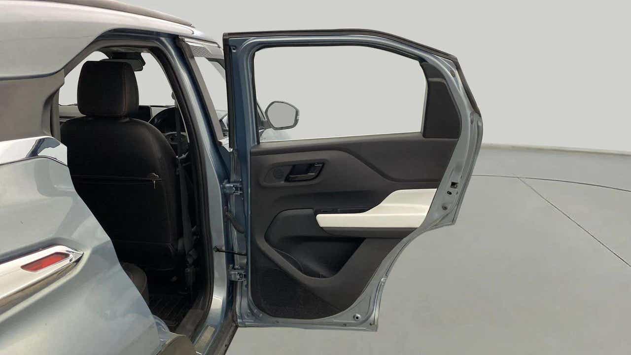 Rear left door open view of a Tata Punch