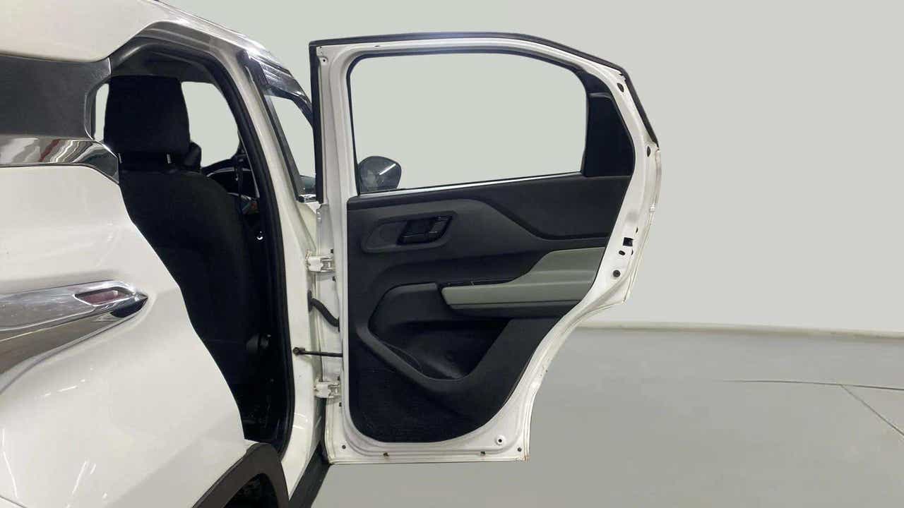 Rear door and seat area of a Orcus White Tata Punch