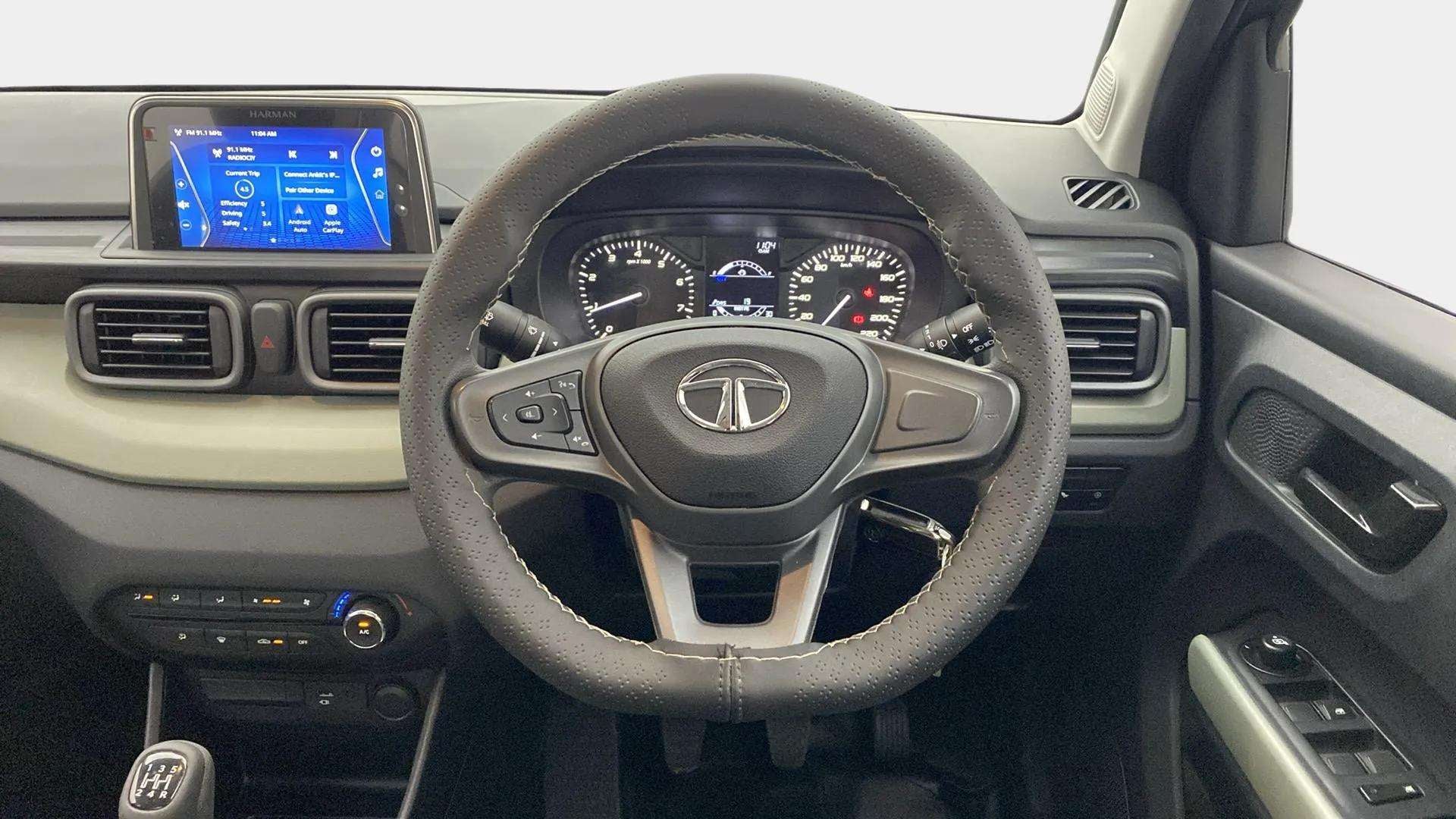 Dashboard and steering wheel view of a Tata Punch