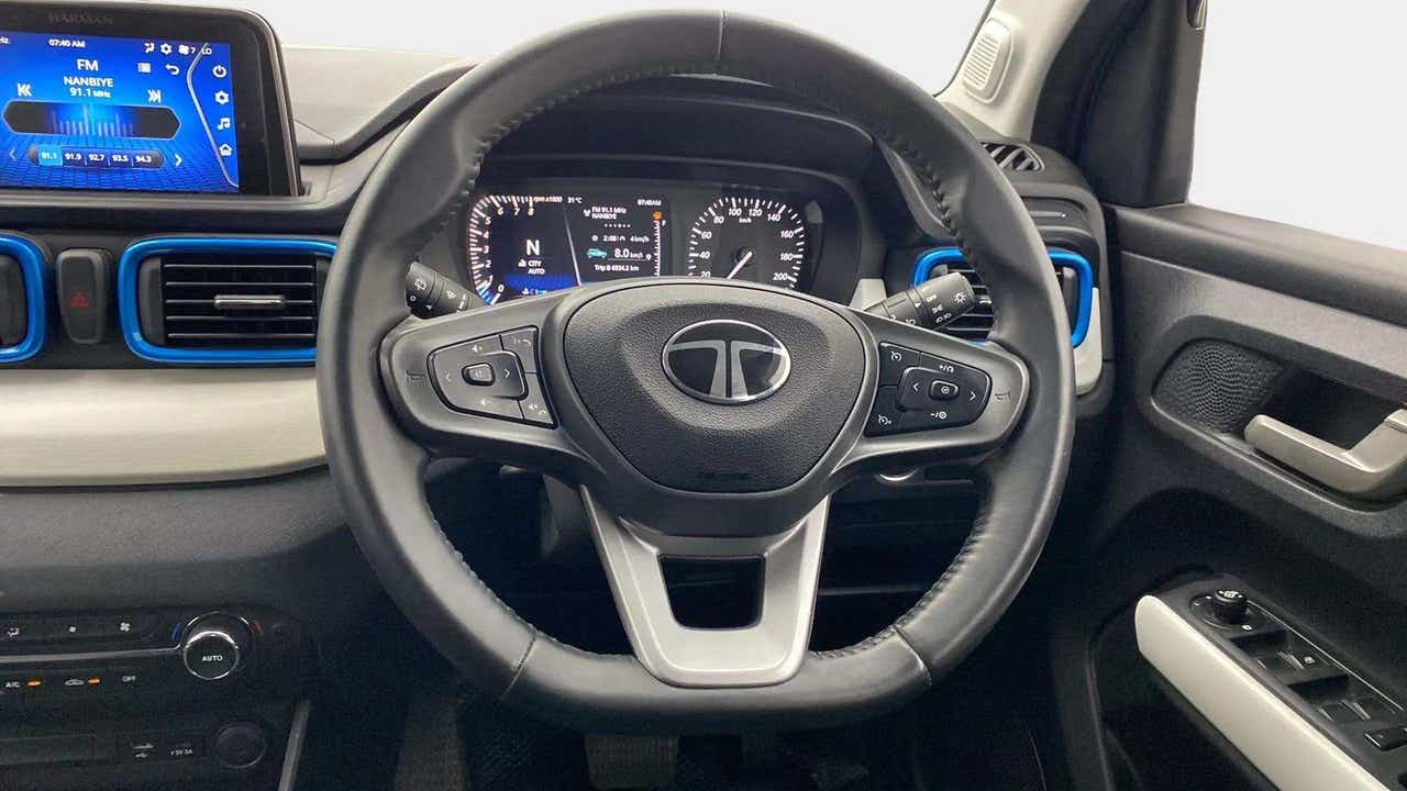 Interior dashboard and steering wheel of a Tata Punch