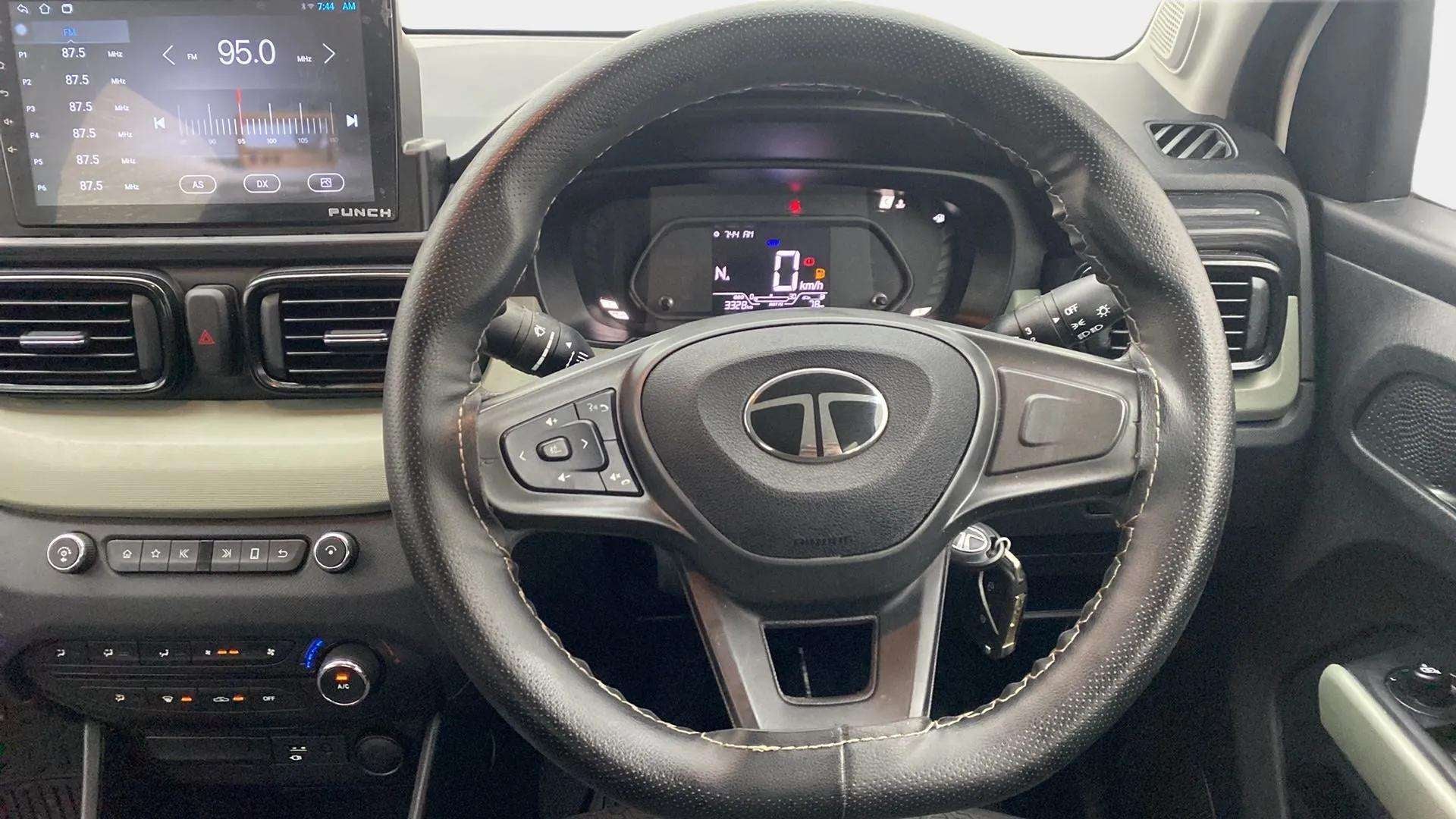 Interior dashboard and steering wheel of a Tata Punch
