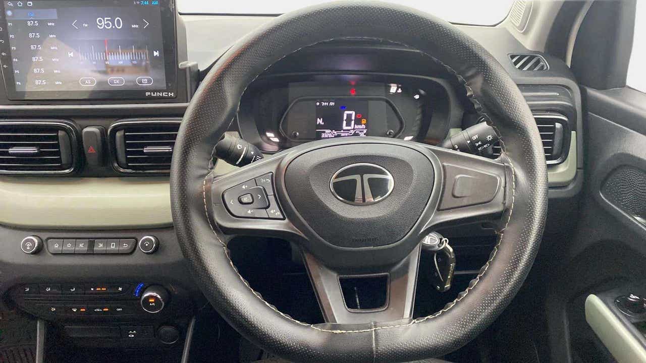 Interior dashboard and steering wheel of a Tata Punch