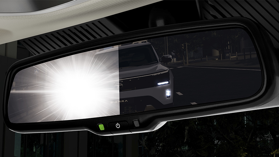 Rearview mirror view of a Tata Sierra