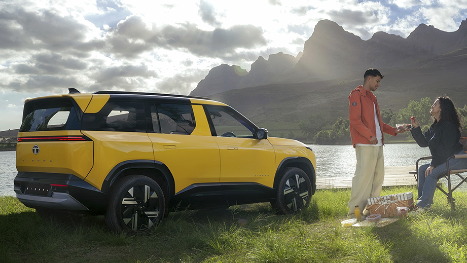 Side view of a andaman adventure Tata Sierra near a lake