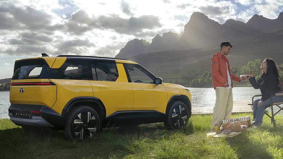 Side view of a andaman adventure Tata Sierra near a lake