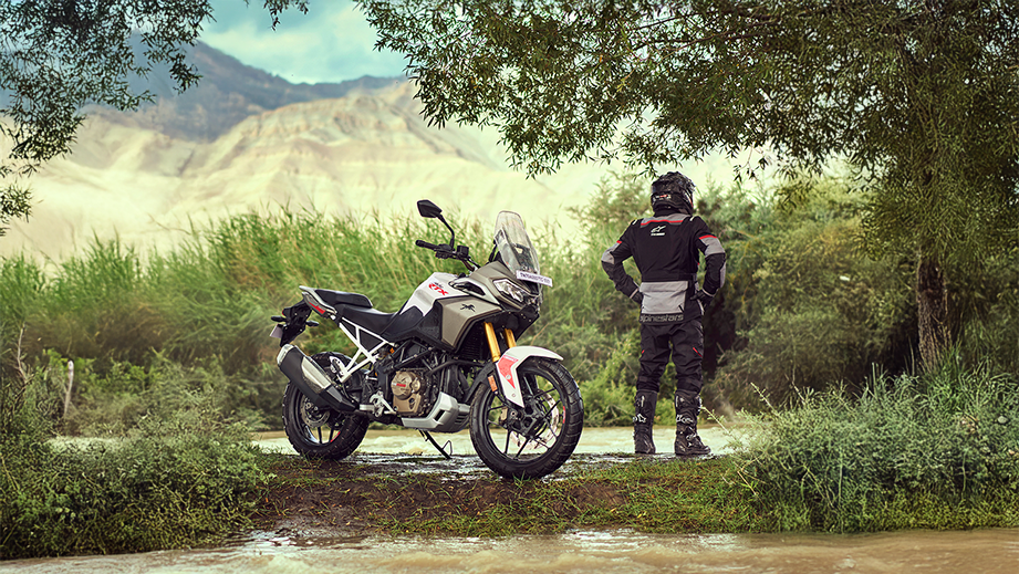 Side view of a tarn bronze TVS Apache RTX motorcycle outdoors