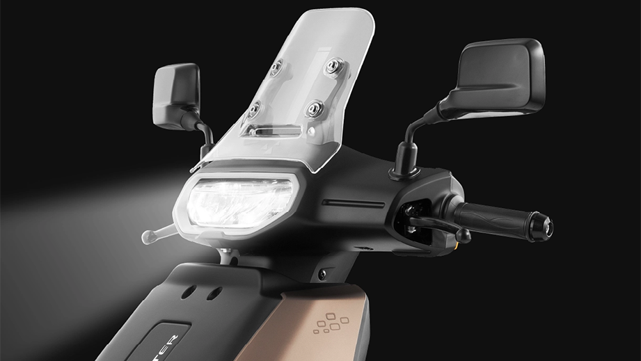 Front headlight and handlebar view of a Martian Cooper TVS Orbiter