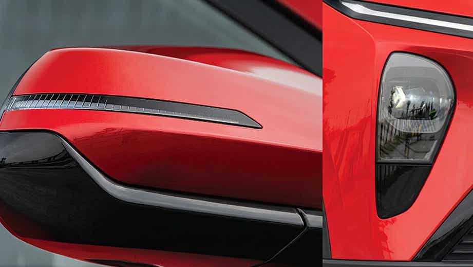 Close-up of side mirror and headlight of Vinfast VF MPV 7