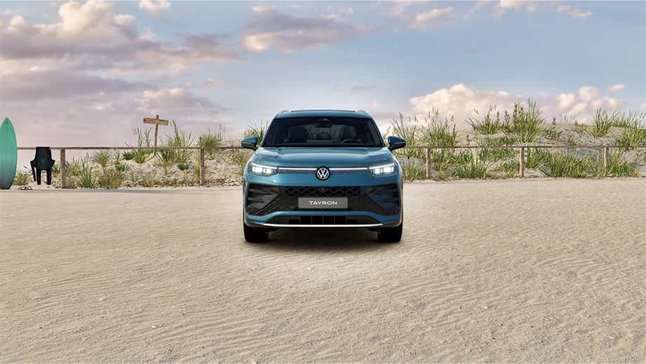 Front view of a Dolphin Grey Metallic Volkswagen Tayron