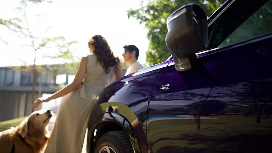 Front side view of a ultra violet metallic Volkswagen Tayron