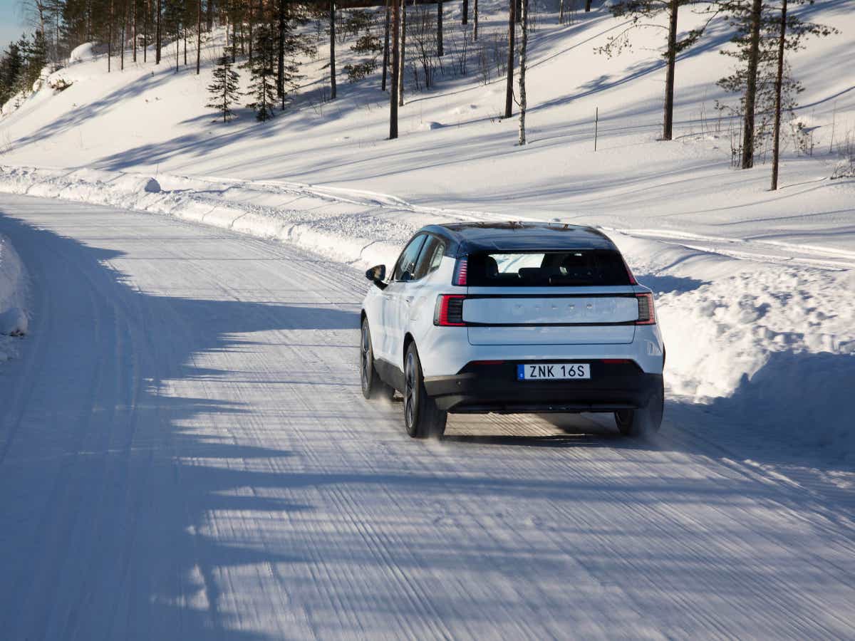 Rear view of a cold blue Volvo EX30