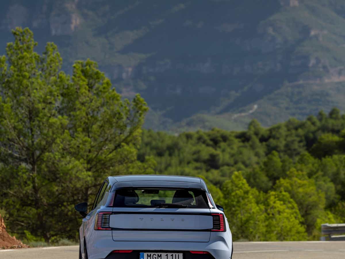 Rear view of a crystal white Volvo EX30