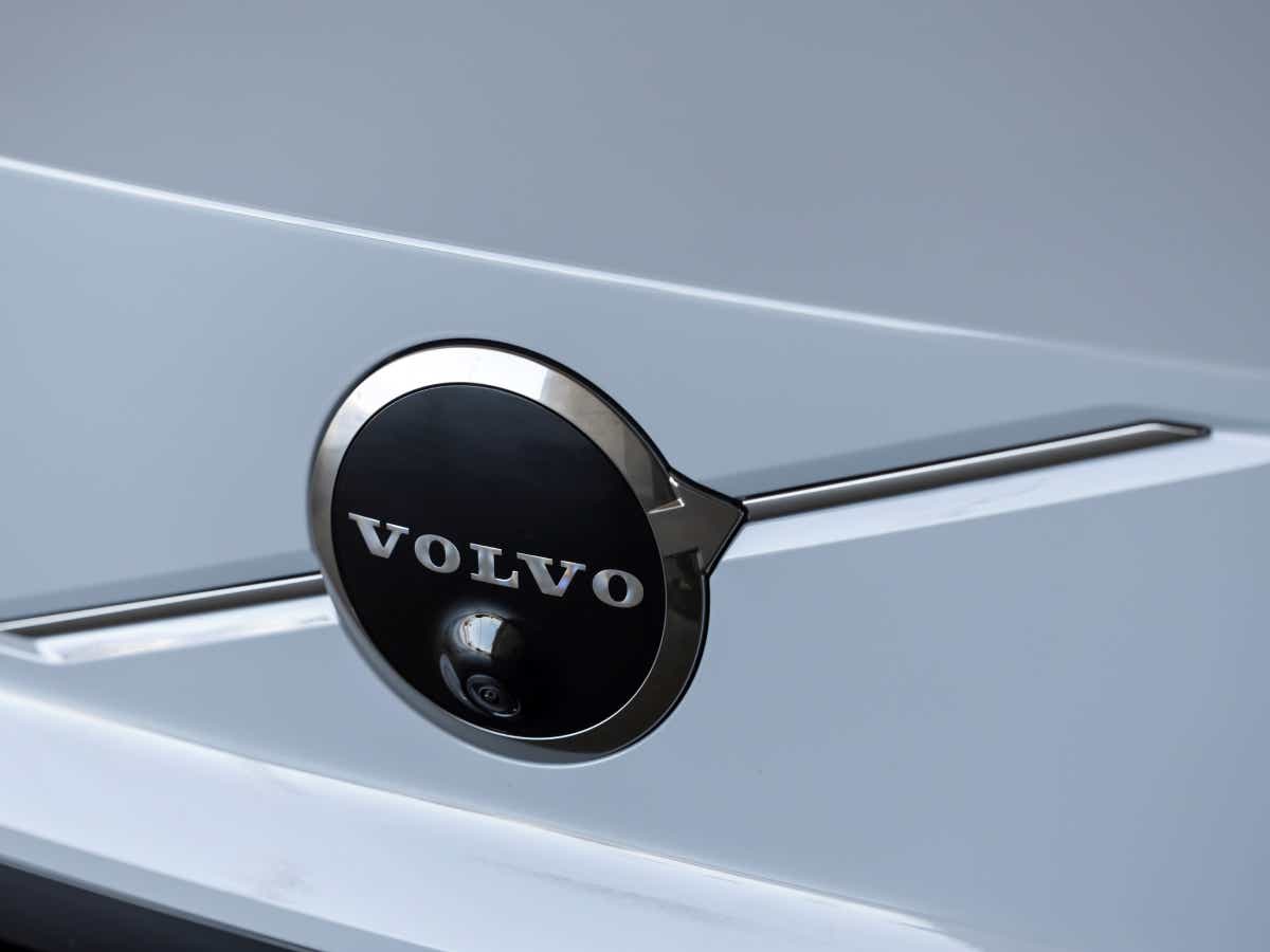 Rear badge close-up of a crystal white Volvo EX30