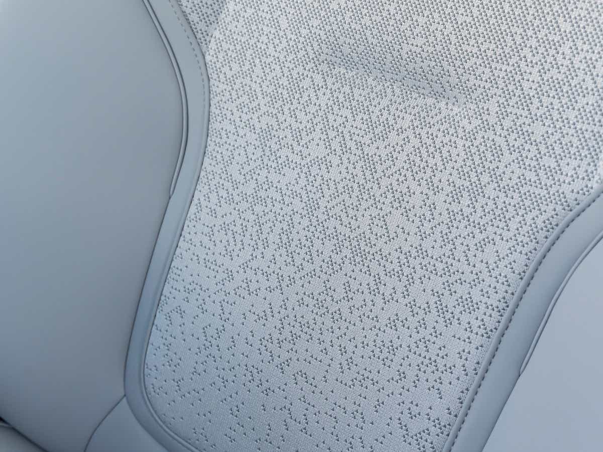 Close-up of a Crystal White Volvo EX30 seat upholstery