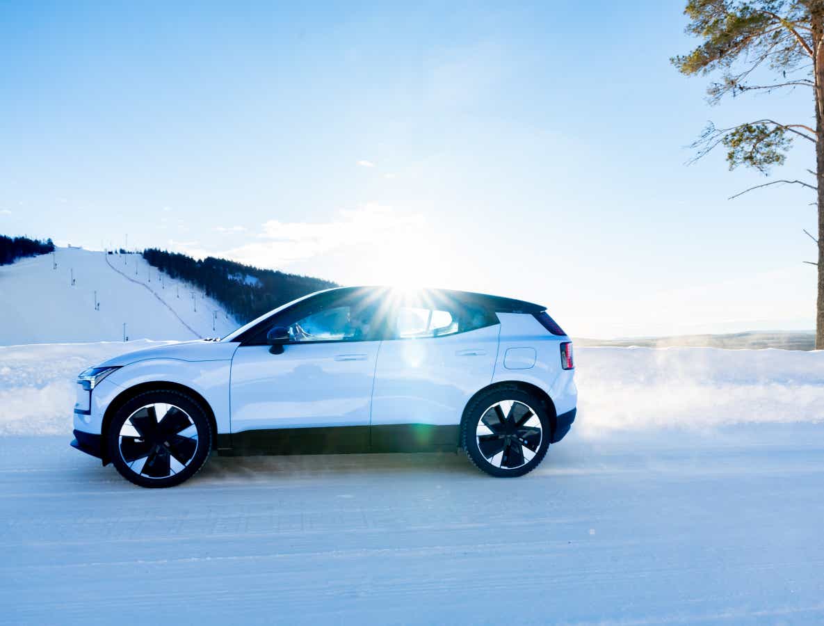 Side view of a cold blue Volvo EX30