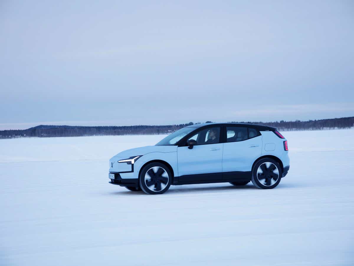 Side view of a cold blue Volvo EX30