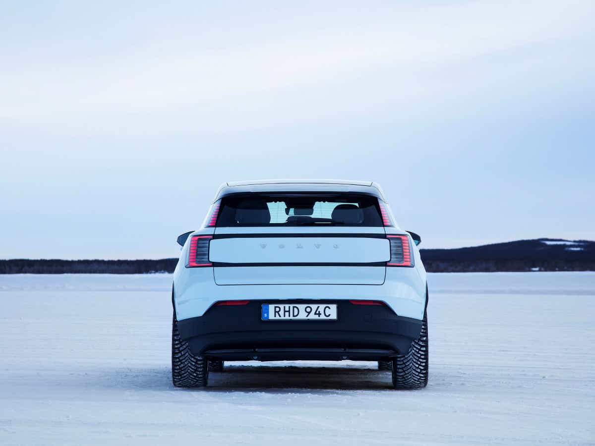 Rear view of a crystal white Volvo EX30