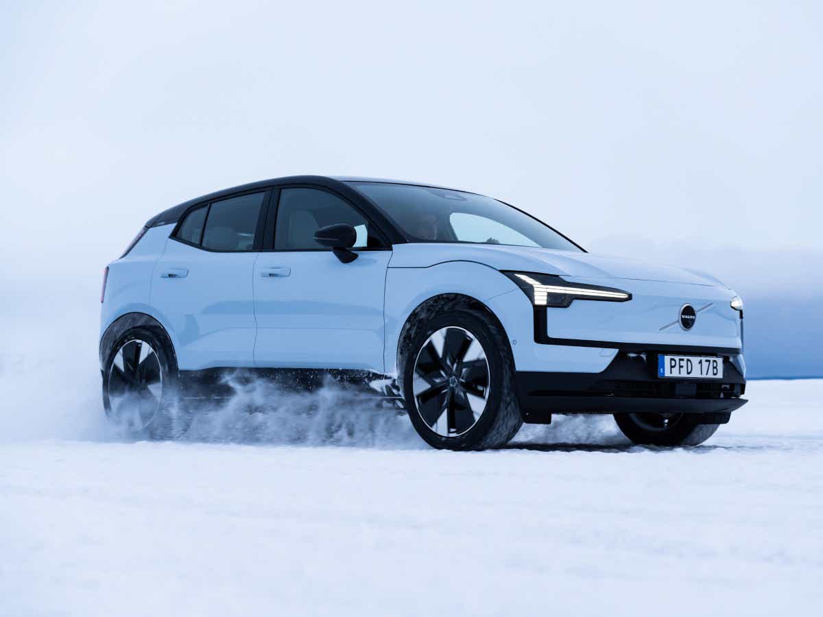 Side view of a cold blue Volvo EX30