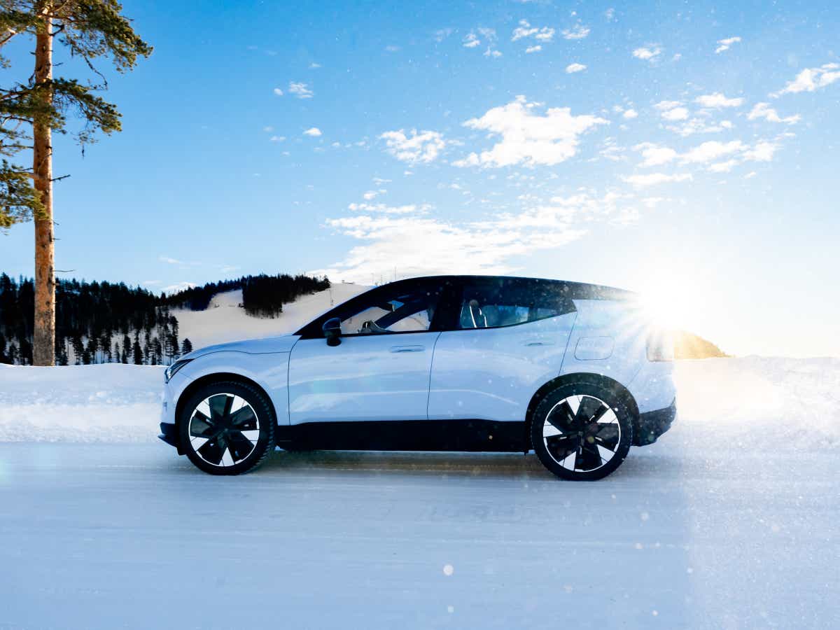 Side view of a cold blue Volvo EX30