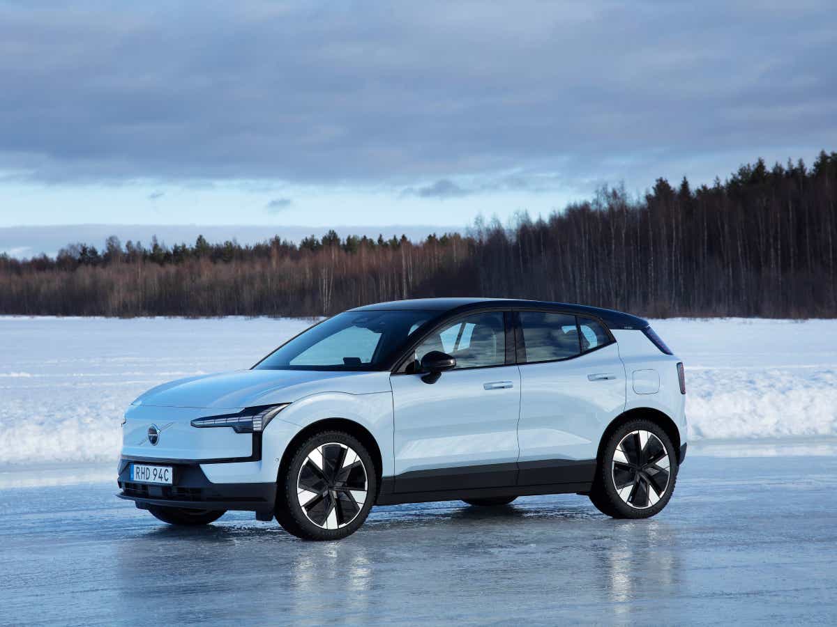 Side view of a cold blue Volvo EX30