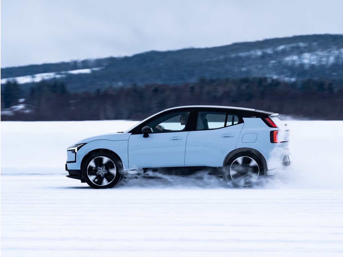 Side view of a cold blue Volvo EX30