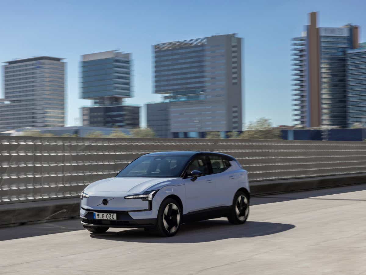 Front three-quarter view of a crystal white Volvo EX30