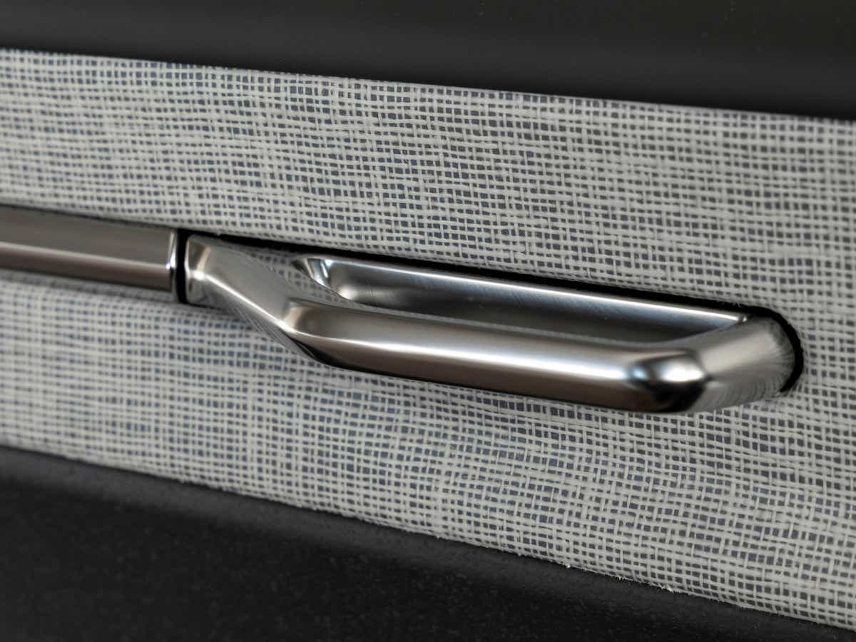 Interior door handle close-up of a Volvo EX30