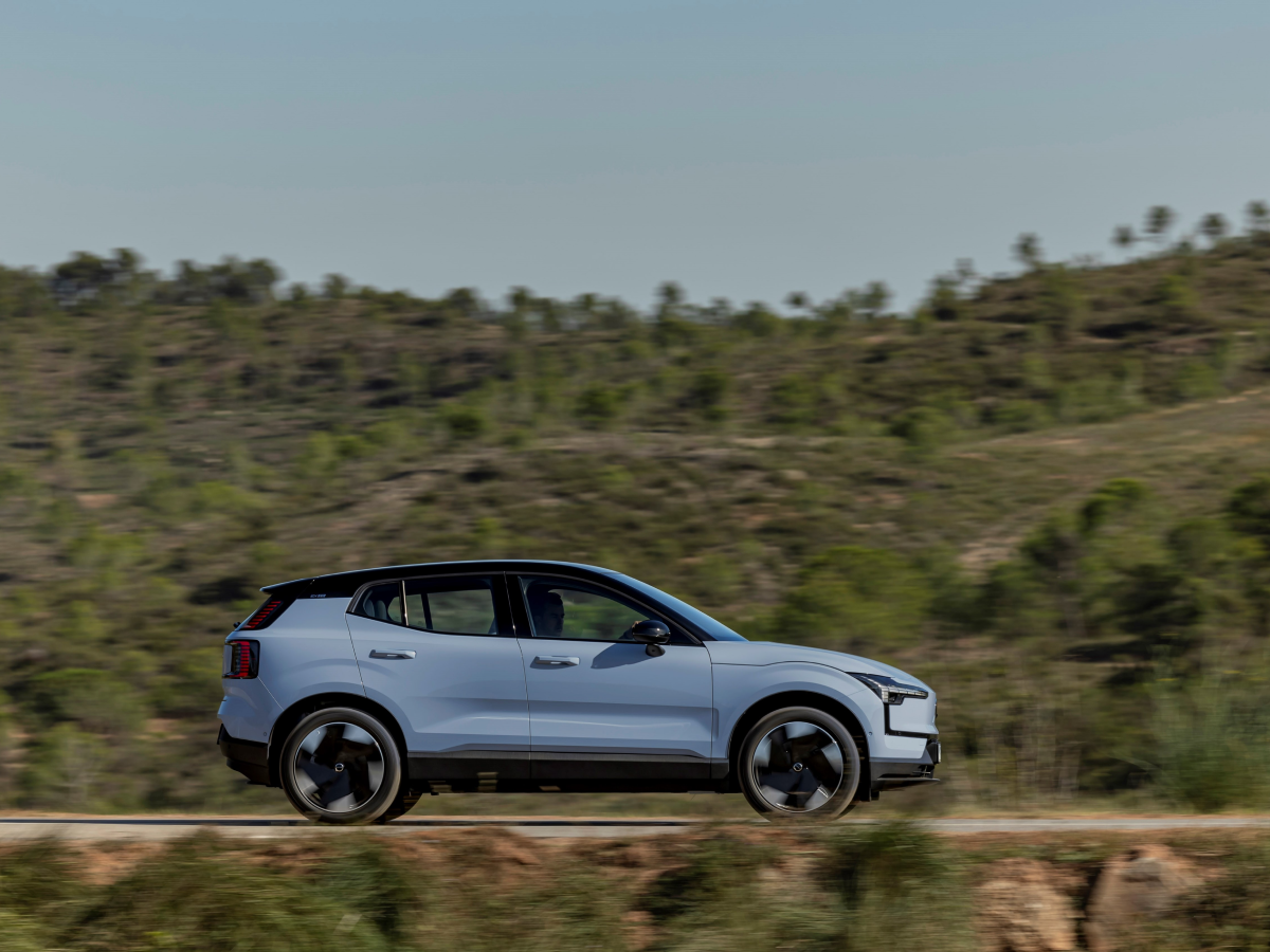 Side view of a cold blue Volvo EX30