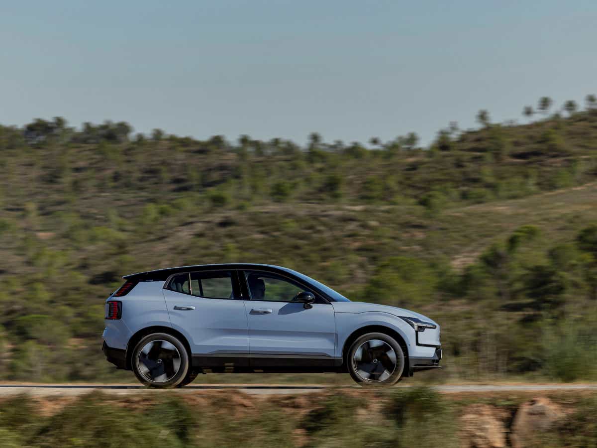Side view of a cold blue Volvo EX30