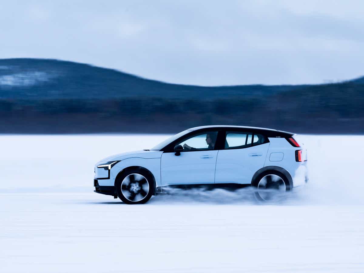 Side view of a cold blue Volvo EX30