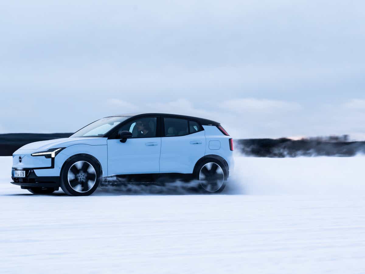 Side view of a cold blue Volvo EX30