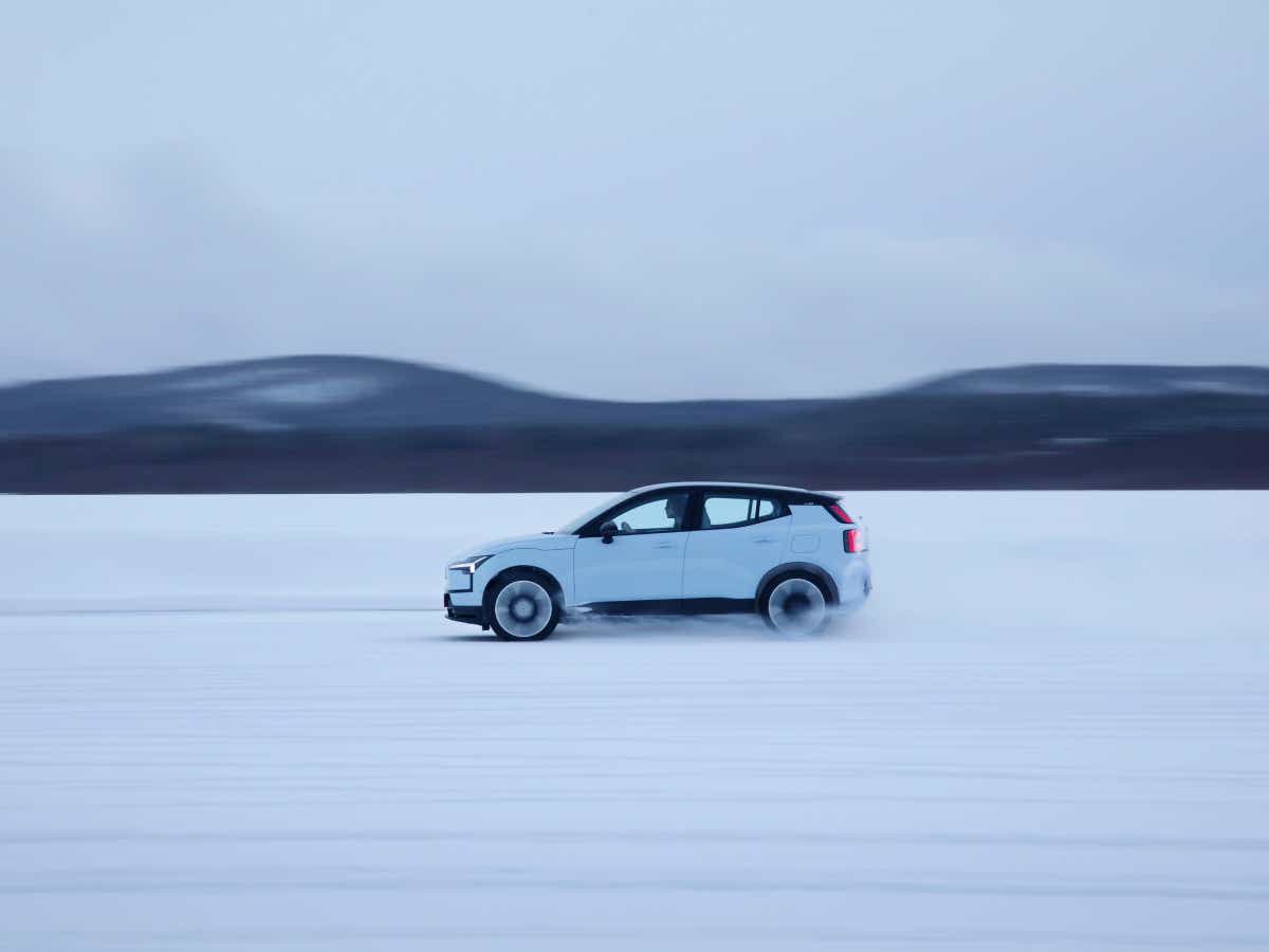 Side view of a cold blue volvo ex30
