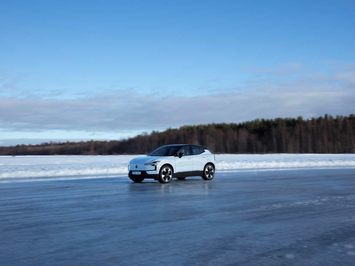 Side view of a cold blue Volvo EX30