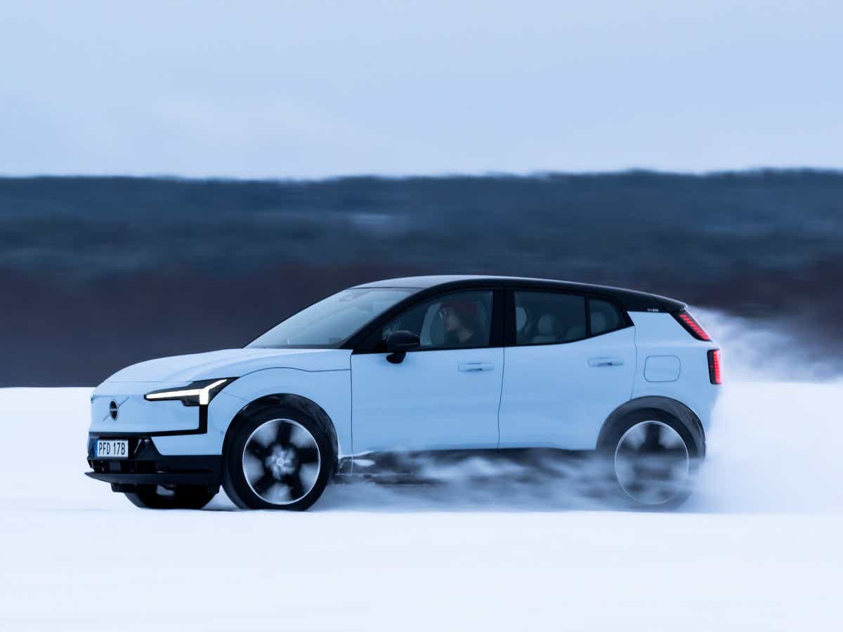 Side view of a cold blue Volvo EX30